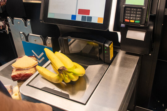 Bananas Being Scanned at a Self-Checkout in a Grocery Store