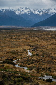 Portrait view of a moody mountain scene in the South Island of NZ.