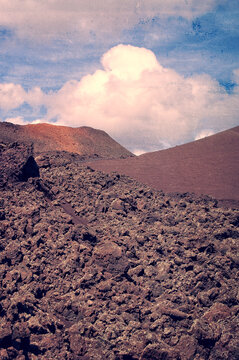 Lanzarote, Canary Islands, Spain: breathtaking desert landscape and the road in Timanfaya National Park (Parque Nacional de Timanfaya), famous geological park entirely made up of volcanic soil