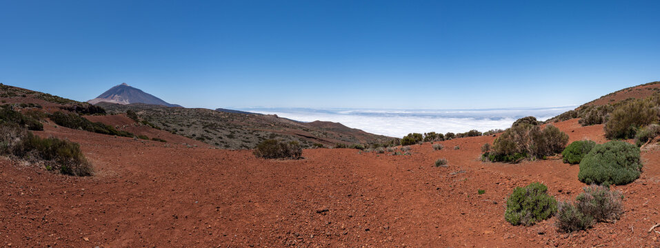 Mount Teide Above Red Volcanic Highlands and Sea of Clouds
