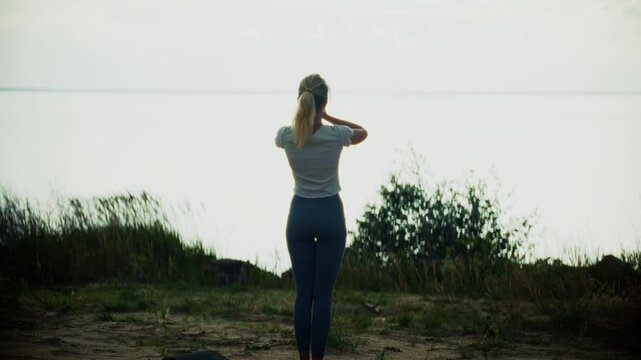 Yogic Standing On Lake Shore With Hands Folded Overhead In Namaste Mudra. Outdoor Meditation 