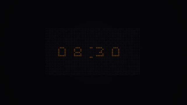 Orange LED Digital Clock Display Showing Ten Thirty Eight on Black Background