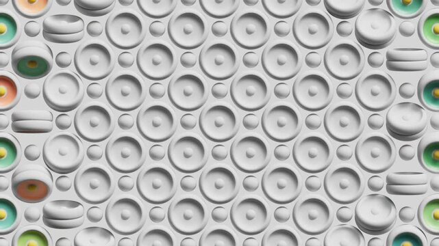 This video loop shows colorful round parts in a white grid. The pieces move smoothly to create a fun background. 3D render animation.