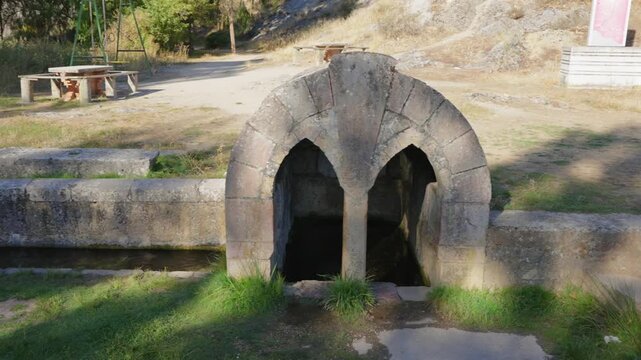 Historic Stone Water Channel with Twin Arched Openings