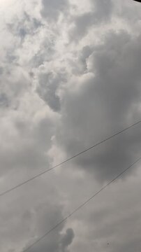 Under a beautiful sky, adorned with small silhouettes that are drawn on the gray clouds.Bajo un hermoso cielo, adornado con peque&ntilde;as siluetas que se dibujan sobre las nubes grises(1)