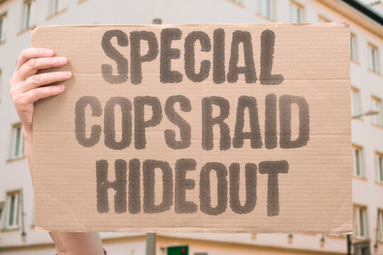 "Special cops raid hideout" Tactical officers breach doors at dawn. SPECIAL. COPS. RAID. HIDEOUT. DAWN.