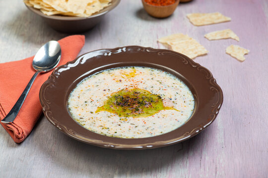 Traditional Maraş tarhana soup with mint and red pepper