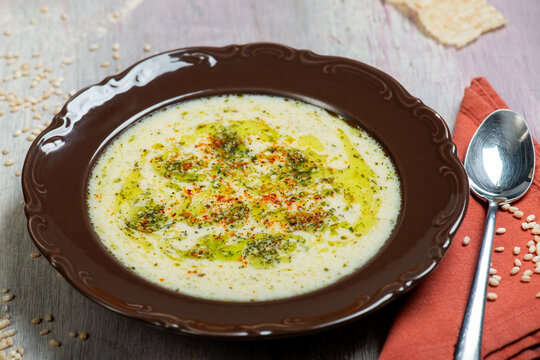 Traditional Maraş tarhana soup with mint and red pepper