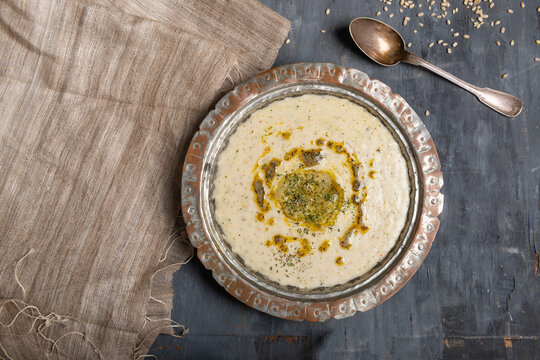 Traditional Turkish tarhana soup with wheat and dried mint