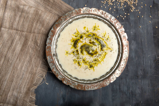 Traditional Turkish tarhana soup with wheat and dried mint