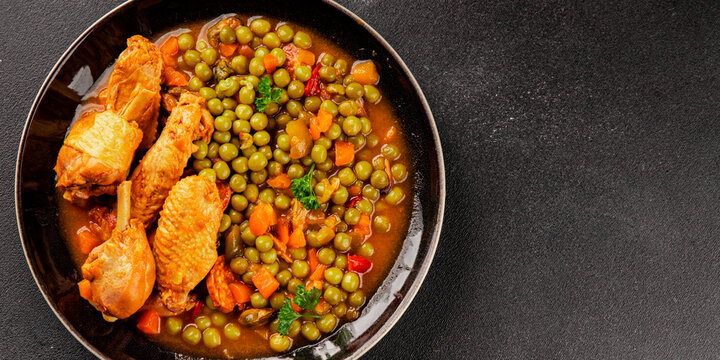 Chicken with Vegetables meat dish green peas, carrots, bell peppers braised spicy chicken delicious appetizer, gourmet dish table setting food background rustic style dish top view, text space