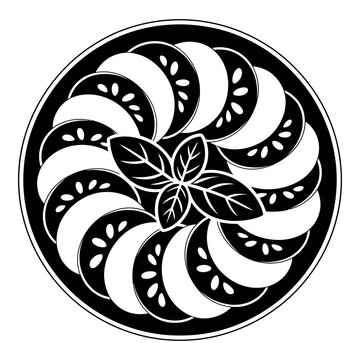 Circular floral ornament with leaves and sliced fruit black silhouette