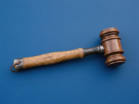Construction hammer designed as wooden judge gavel
