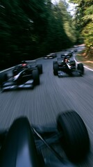 Fototapeta premium Formula 1 race cars speeding through a circuit turn