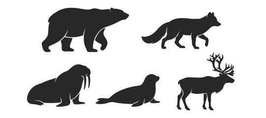 Fototapeta premium Set of black silhouettes of arctic animals including polar bear fox walrus seal and reindeer