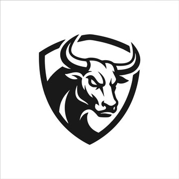 Stylized bull head vector emblem inside a protective shield with strength protection branding aggressive isolated business