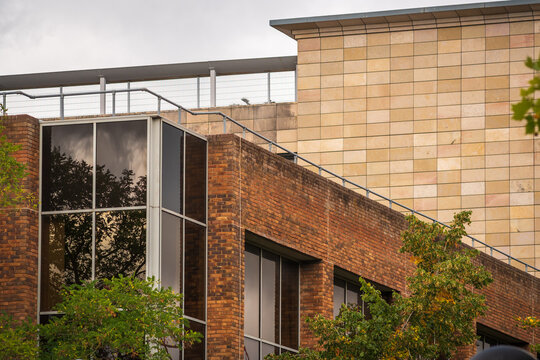 Modern Glass Office Building With Blue Reflection And Abstract Facade In Urban Architecture in England UK