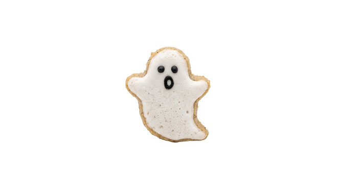 Single ghost shaped sugar cookie with white icing isolated on a plain white background studio