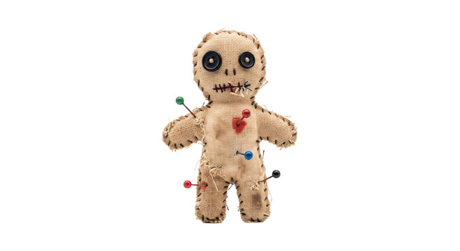 Handmade burlap voodoo doll with button eyes and colorful sewing pins on white background