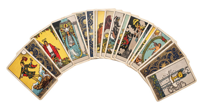 Fan of vintage tarot cards spread out in an arc against a clean white background for display