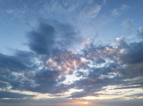 Cloudy sky during sunset over a landscape