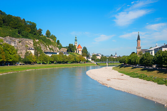 Salzach river Salzburg, at the left Monchsberg. view to historic churches. austrian tourist resort