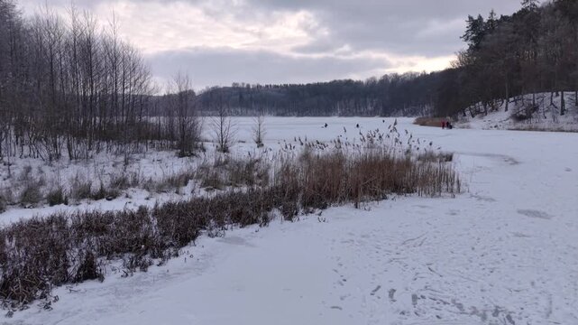 Winter landscape of the frozen lake in Poland.