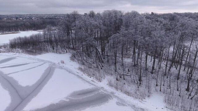 Winter landscape of the frozen lake in Poland.