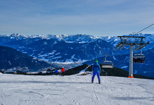 Rear view of a skier above the valley at Zell am See Austria