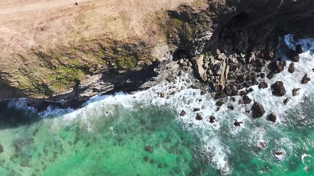 Top Down View of Trevone Round Hole over Trevone Bay from a drone, Trevone, Padstow, Cornwall, England, United Kingdom, Summer 2026