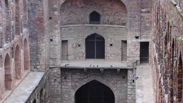 Agrasen Ki Baoli, Delhi, India is a historic stepwell known for its striking stone architecture, ancient steps, arches, and heritage atmosphere.