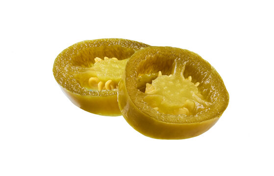 slices pickled jalapeno isolated on white background.