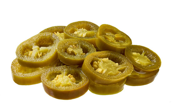 Heap of pickled jalapeno isolated on white background. Pile marinated jalapeno isolated.