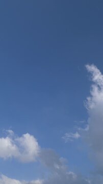 Cumulus Cloud Building Up in Clear Blue Sky Time Lapse Vertical