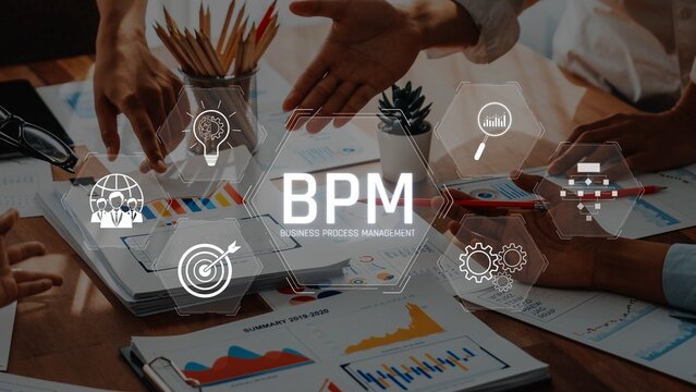 A dynamic meeting illustrates a business process management strategy, showcasing teamwork with charts and visual elements for enhanced productivity and insights. Raster