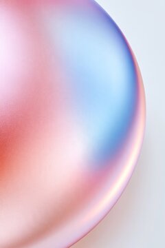 Minimal abstract pink and blue iridescent rounded surface with soft pearlescent gradient and copy space