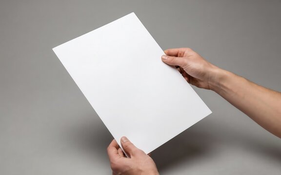 Hands holding a blank white paper sheet