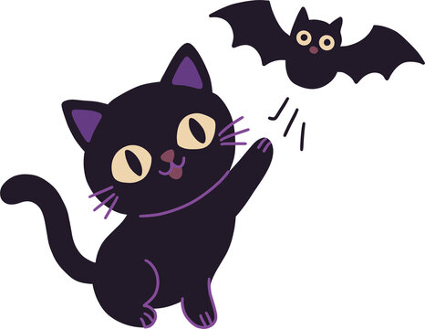 Cute black cat reaching and trying to catch a flying bat for Halloween