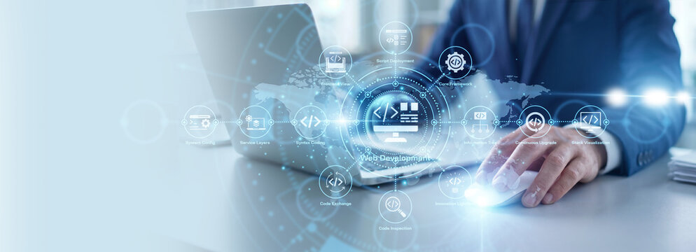 Front end designer working on laptop, web development and interface design. Coding responsive websites and user experience. Programming for modern internet platform and digital contents.