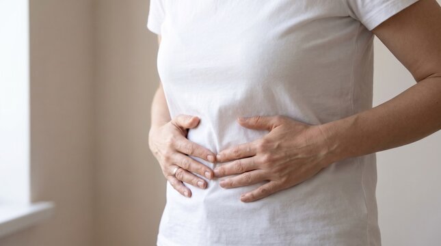 Woman Holding Abdomen Suffering From Stomach Pain