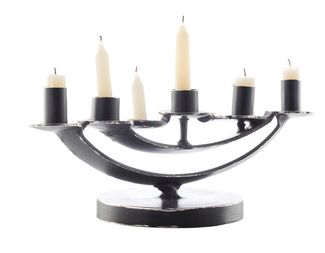 Black metal menorah with white candles isolated on transparent background cutout stock image photography metallic multi holder candelabra featuring six wax varying heights completely
