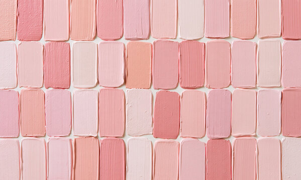 an abstract background pattern made of thick, textured pink paint strokes. the strokes are vertical and rectangular