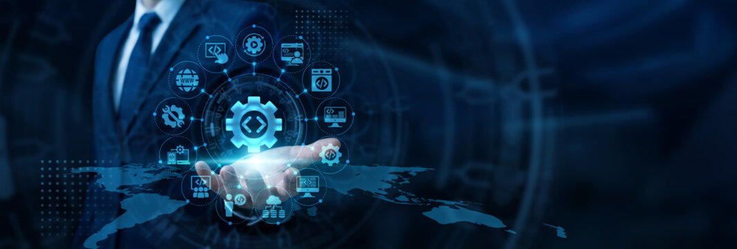 Lead programmer hand holding modern laptop reviewing agile coding sprints for Software Development projects and product launches. Efficient programming practices creating stable platforms.