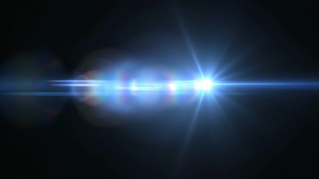 Bright blue anamorphic lens flare footage with rainbow light leaks over black background