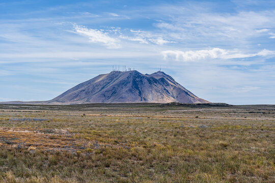 Volcanic Cinder Cone Above Grassland