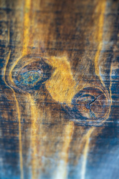 Vintage aged wooden texture background featuring natural wood grain pattern and knots from traditional architecture in South Korea.