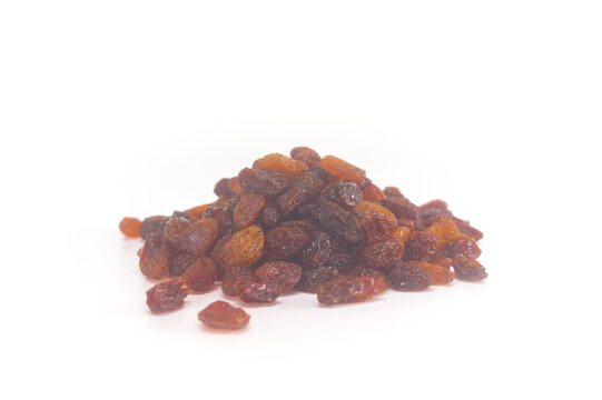 Pile of mixed raisins isolated on a white background