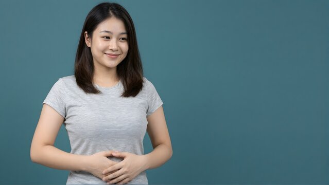 Happy Asian Woman Touching Stomach Contented Gut Health Concept Blue Background