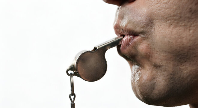 Man Blowing Metal Whistle With Copy Space On White Background