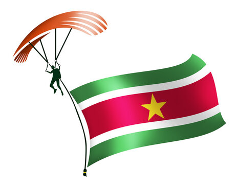 A skydiver, A paratrooper, A parachutist carrying a flag of Suriname